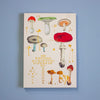 Book cover with illustrations of mushrooms on a blue background