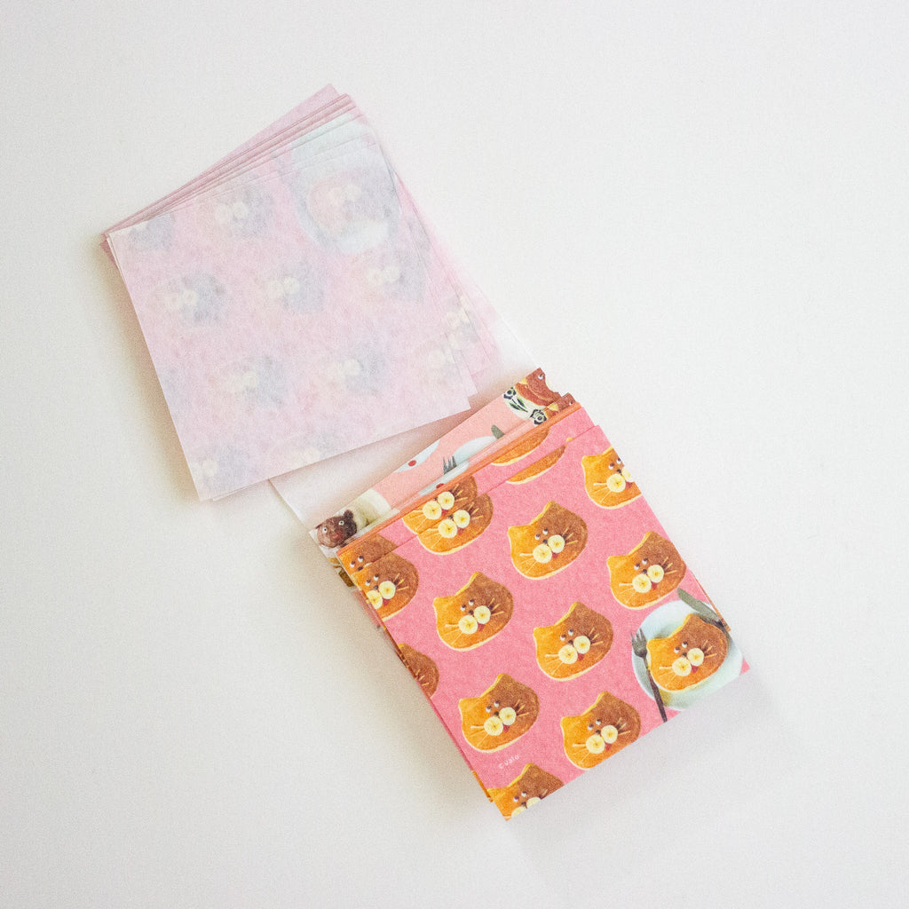 A set of cute breakfast-themed stationery memo sheets with illustrations of pancakes, and cat faces.