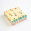 A stack of cute memo sheets with a pastel pattern of cartoon animals on a grid background, featuring a green band that reads 'valo's kitchen' and ' assorted memo'.