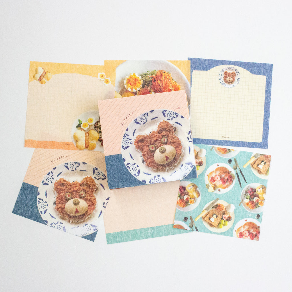 A set of cute bear-themed memo sheets, featuring illustrations of teddy bears, food, and patterned borders in pastel colours.