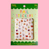 Missy Minz Nail Stickers in a green and light green window box package, featuring a variety of colourful nail art stickers including Australia related food, flowers, and animals on a white background.