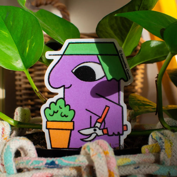 Cartoon character sticker on a plant with colourful background