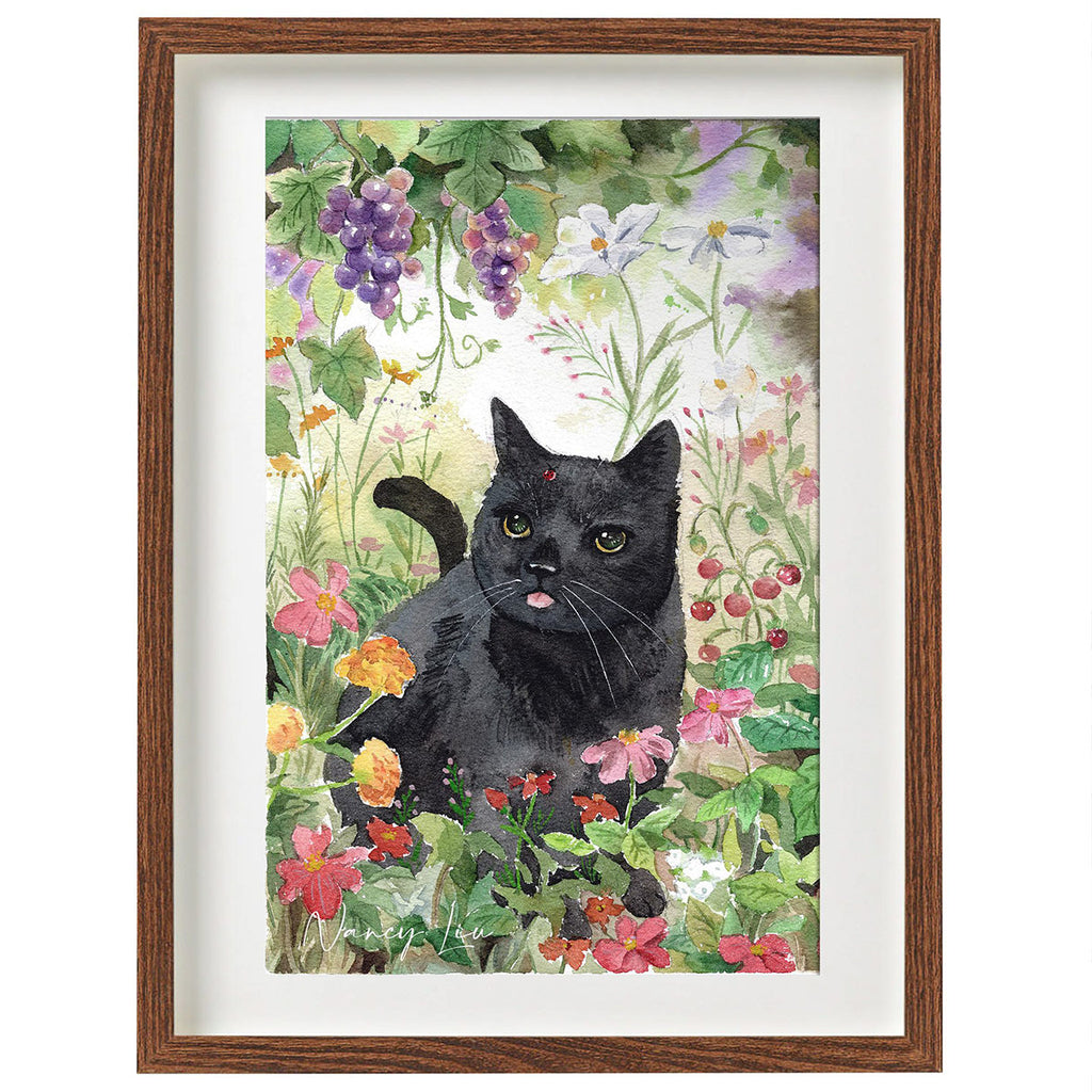 Framed artwork of a black cat among flowers with a wooden frame.