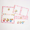A letterset pink and white stationery sheets and envelopes with colourful cartoon animal illustrations and floral borders, arranged on a plain white background.