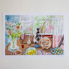 Illustration of two cats on a table with food and flowers, window in the background