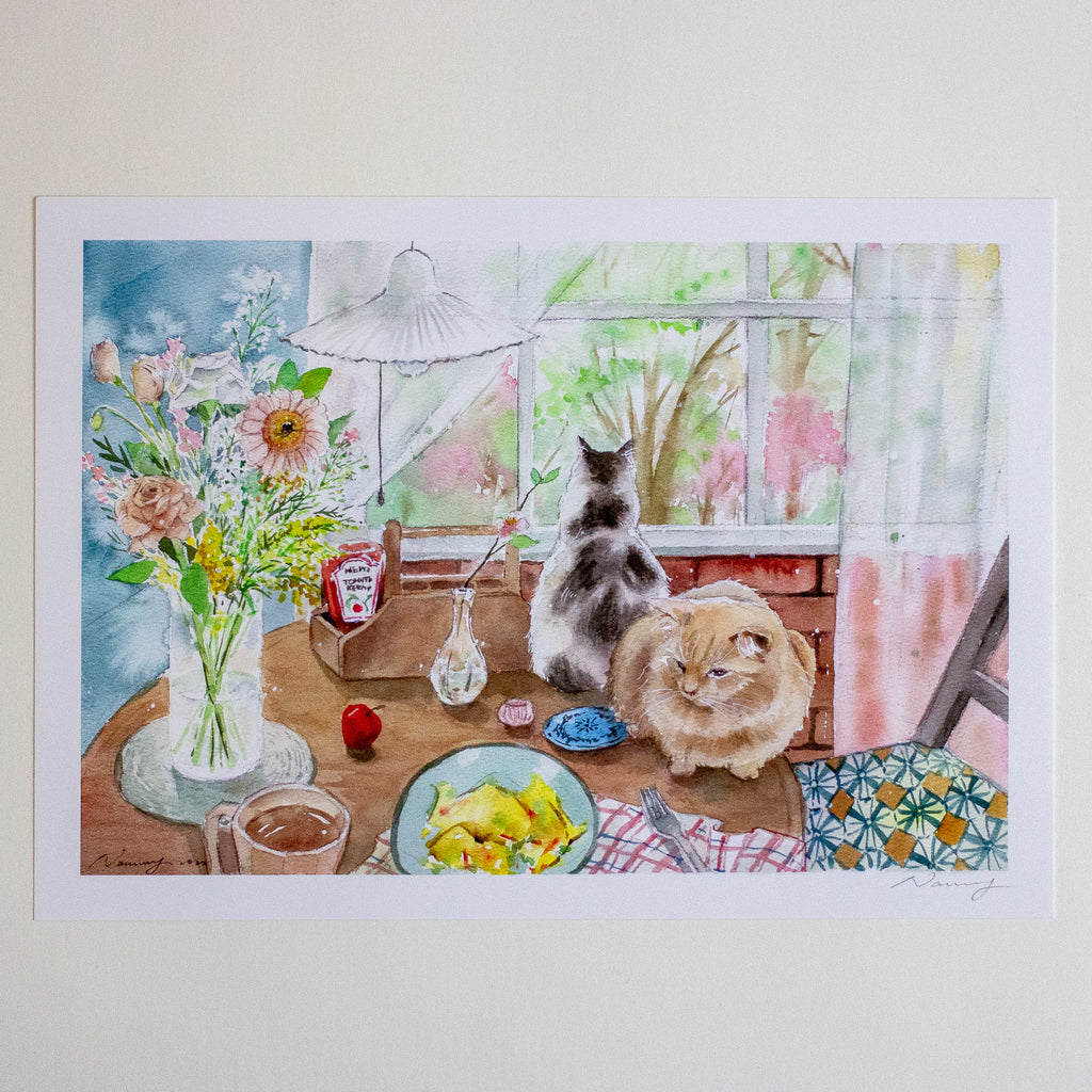 Illustration of two cats on a table with food and flowers, window in the background