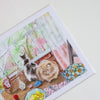 Illustration of two cats on a table with a window and flowers in the background
