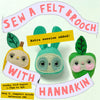 Promotional graphic for a sewing class featuring three cute felt brooches: a yellow pear, a mint green bunny, and a green apple. Large text reads 'SEW A FELT BROOCH' and 'WITH HANNAKIN', with additional details about the event date and location.