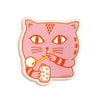 A die-cut sticker featuring a stylised pink cat illustration with red outlines, holding a yellow lollipop and a small white cup, shown on a plain white background.