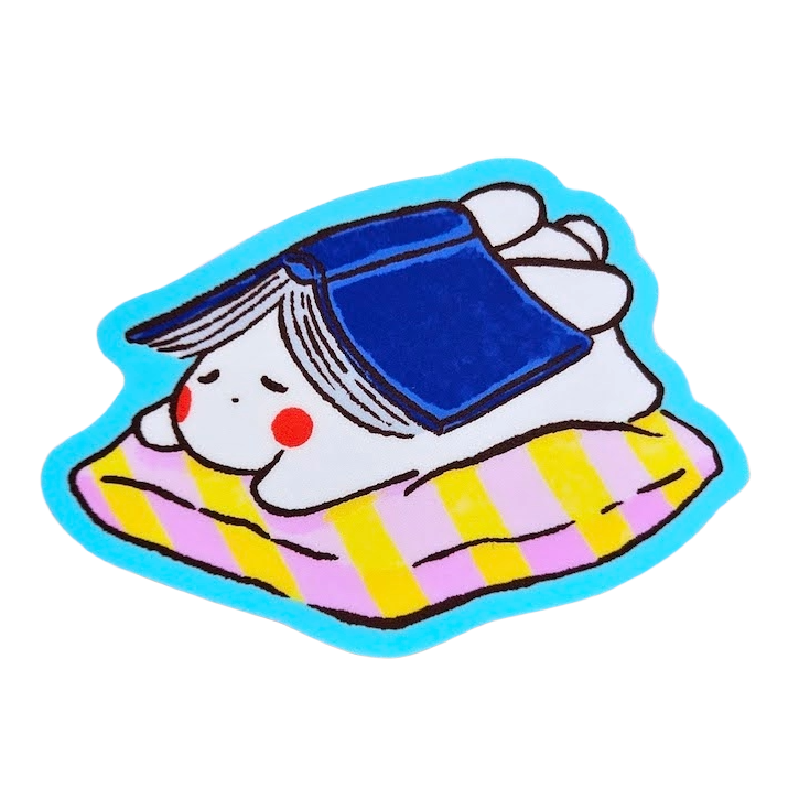 A cute cartoon sticker of a white bunny wearing a blue cap and lying on a pink and yellow striped blanket, outlined in bright blue, shown on a plain white background.
