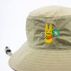 Beige bucket hat with a colourful embroidered bunny design on a white background