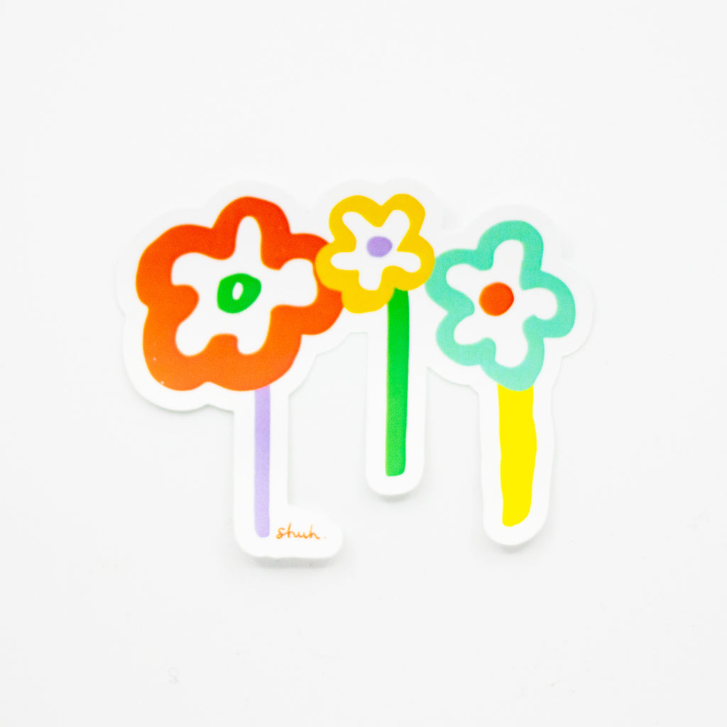 Calm sticker, 3 flowers with different coloured heads and stems. 
