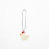 Keychain with a chicken-shaped charm on a white background