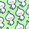 A repeating pattern of cute cartoon garlic stickers on a light green background. The garlic characters are white with pale pink shading, closed smiling eyes, pink cheeks, and dark navy blue outlines.