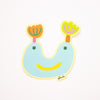 Cora sticker, an aqua coloured monster with tulip ears. 