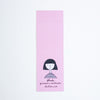 A tall, narrow pink bookmark featuring a simple black line drawing of a person with short dark hair and the text 'shuh. printed in australia shuhlee.com' near the bottom, shown on a plain white background.