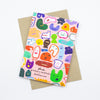 Back view of the creatures card print. Multiple different monsters and creatures on a pink background. 