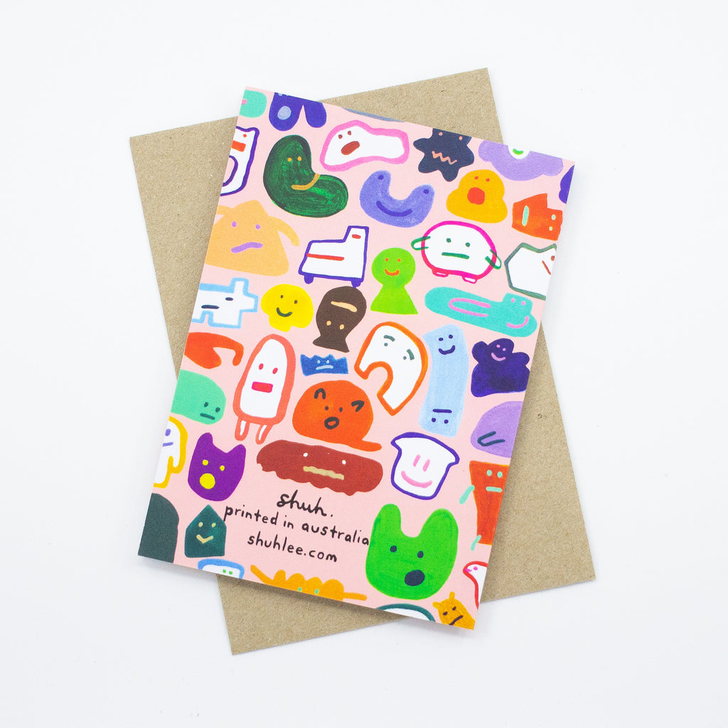 Back view of the creatures card print. Multiple different monsters and creatures on a pink background. 