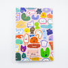 Back cover of the creatres a5 notebook. Pink background with varied characters and monsters from shuh.'s imagation. 