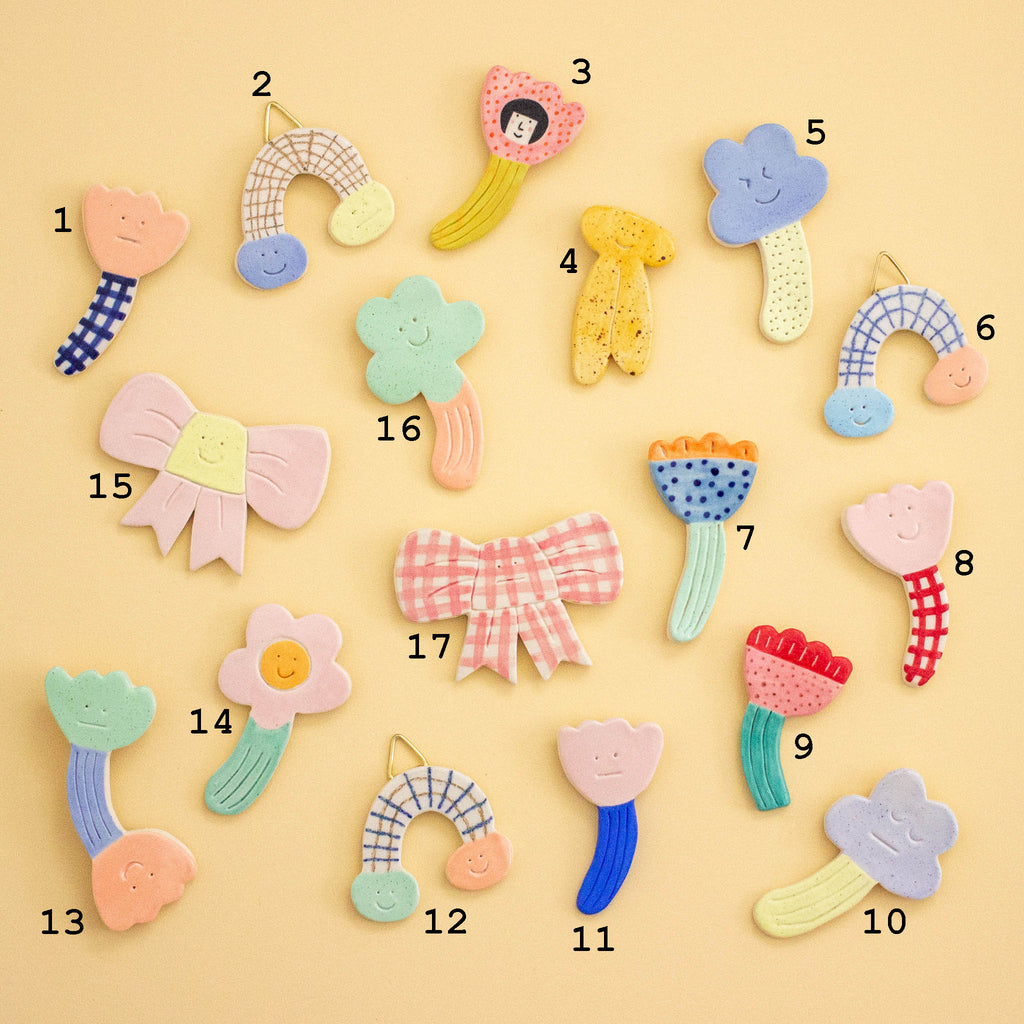 Colorful decorative ceramic items on a yellow background