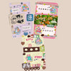 Set of colourful animal-themed cards on a beige background