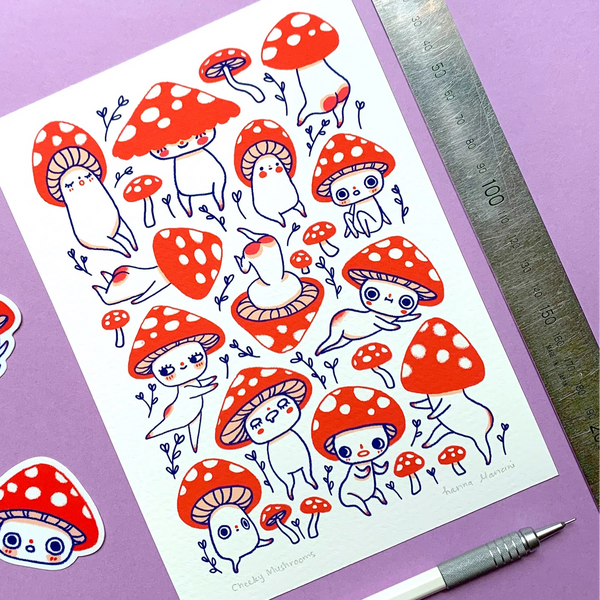 Sheet of mushroom-themed stickers with a ruler and pen on a purple background