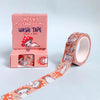Washi tape with mushroom design and packaging on a light grey background