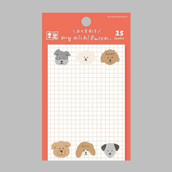 A sheet of decorative sticky notes with a white grid background and cute dog face illustrations, mounted on a coral-orange backing card. The card shows the text '25 sheets' and a small brand mark at the top right.