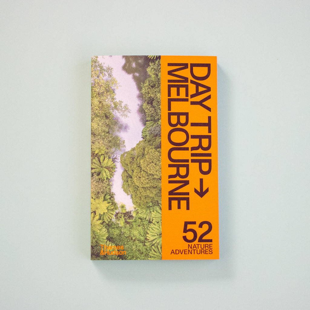 Book titled 'Day Trip Melbourne: 52 Nature Adventures' on a light mint background