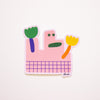 The dolly vinyl sticker. Pink monster with flower hands and green smile!