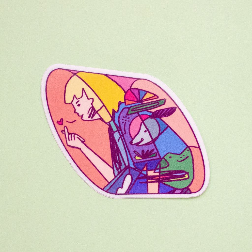 A die-cut sticker featuring a colourful, illustration of a human with blonde hair with a blue and green animal character, shown on a pale green background.