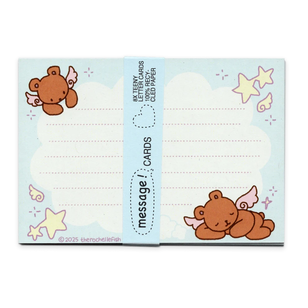 A blue pack of cute message cards featuring cartoon teddy bears, stars, stars, and wings, wrapped with a blue paper band labeled 'message cards'.