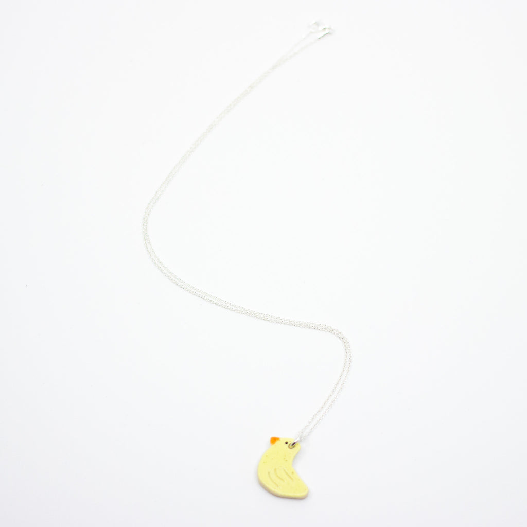 Necklace with a Duck-shaped pendant on a white background