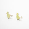 Pair of yellow duck-shaped earrings with sterling silver studs on a white background