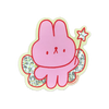 A pink cartoon bunny sticker with red outlines, glittery green wings, and a small star wand, shown on a plain white background.