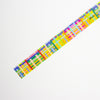 Colorful geometric patterned tape on a white background