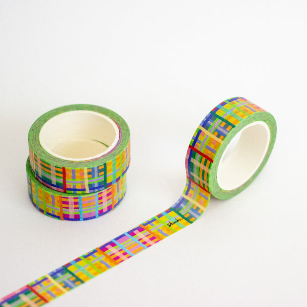 Colorful washi tape with a geometric pattern on a white background