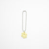 Keychain with a yellow flower charm on a white background