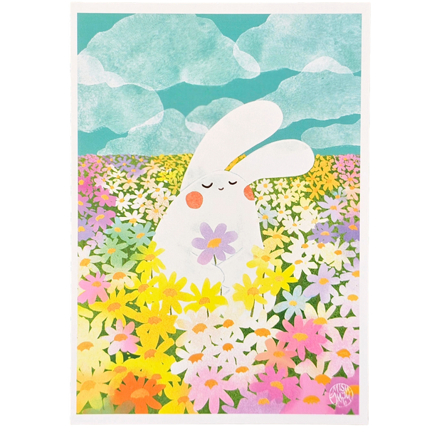 An art print featuring a cute white bunny standing in a colourful field of flowers under a teal sky with clouds. The print has a white border and is shown against a white background.