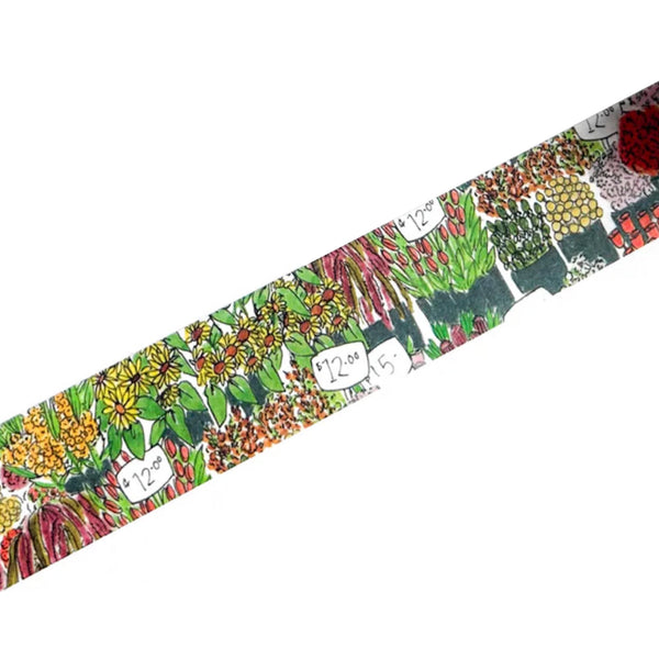 A close-up of a patterned paper tape featuring a botanical market print with hand-drawn flowers, leaves, and handwritten price tags on a white background.