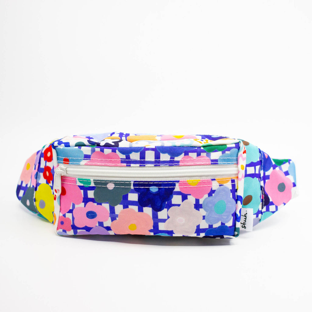 Multicolored floral-patterned bum bag on a white background