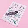 An illustrated print with a bird and words 'I only really want it if my friends get a slice' on a white background, photographed on a pink backdrop. 