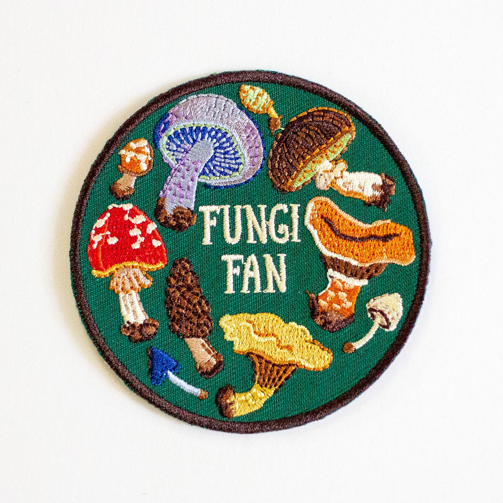 Circular patch with illustrations of mushrooms and the text 'Fungi Fan' on a green background.