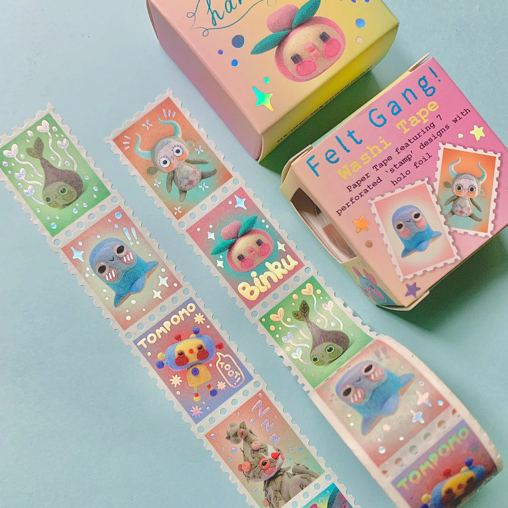 Set of colourful felt stickers with cartoon characters on a light blue background