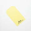 A closeup picture of the squares gift tag. This photo shows the blank reverse side of the tag. 