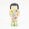 A Front View of the girl figurine number 8. Floral pattern. 