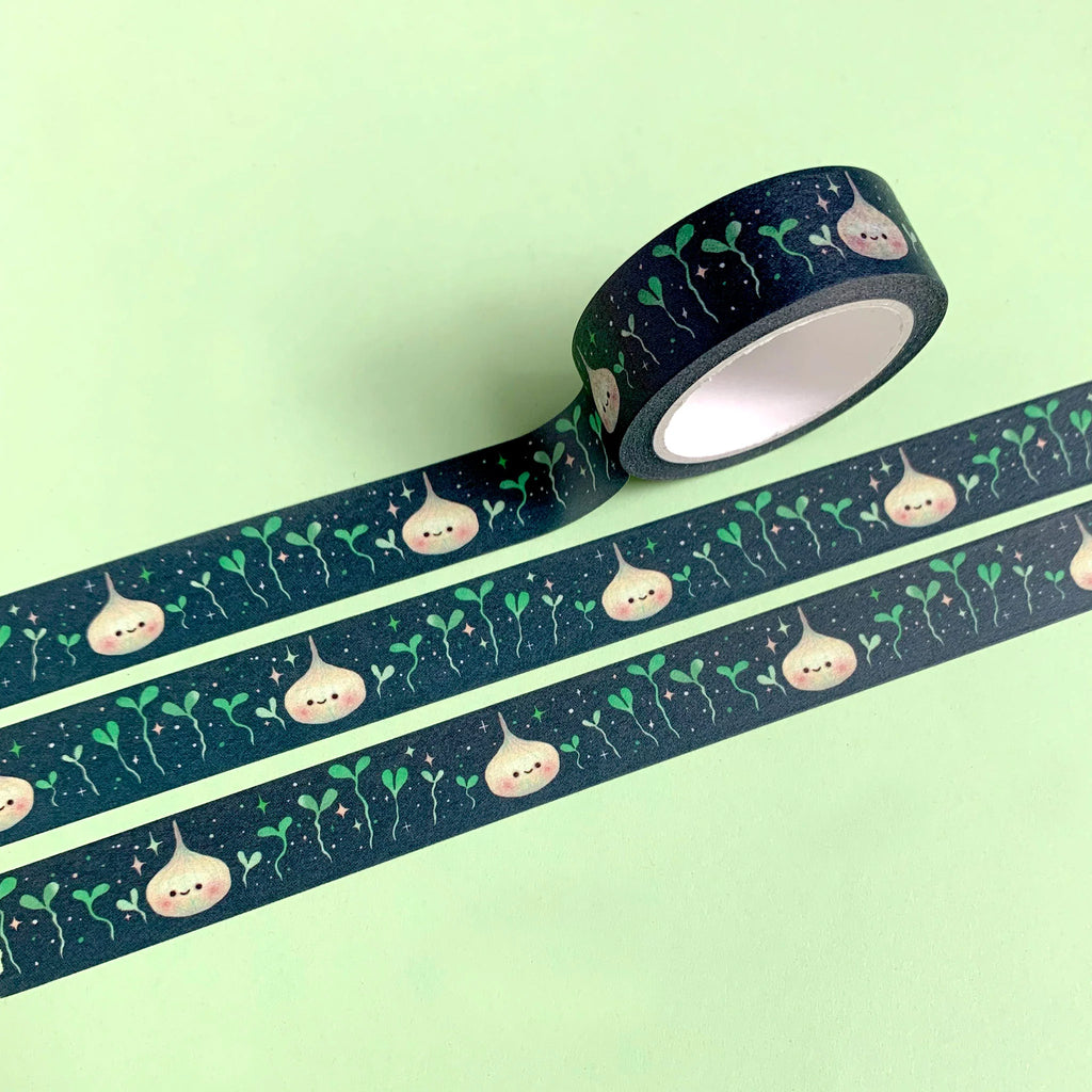 Decorative tape with cute character design on a green background