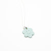 Light blue cloud-shaped pendant on a white background