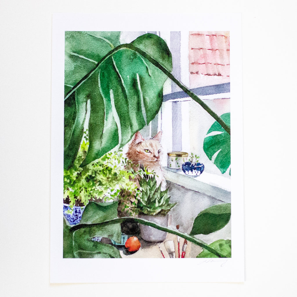 A watercolour art print depicting a ginger cat sitting among large green monstera leaves and potted plants on a windowsill, shown against a clean white background.