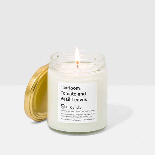 Candle in a glass jar with a label on a white background